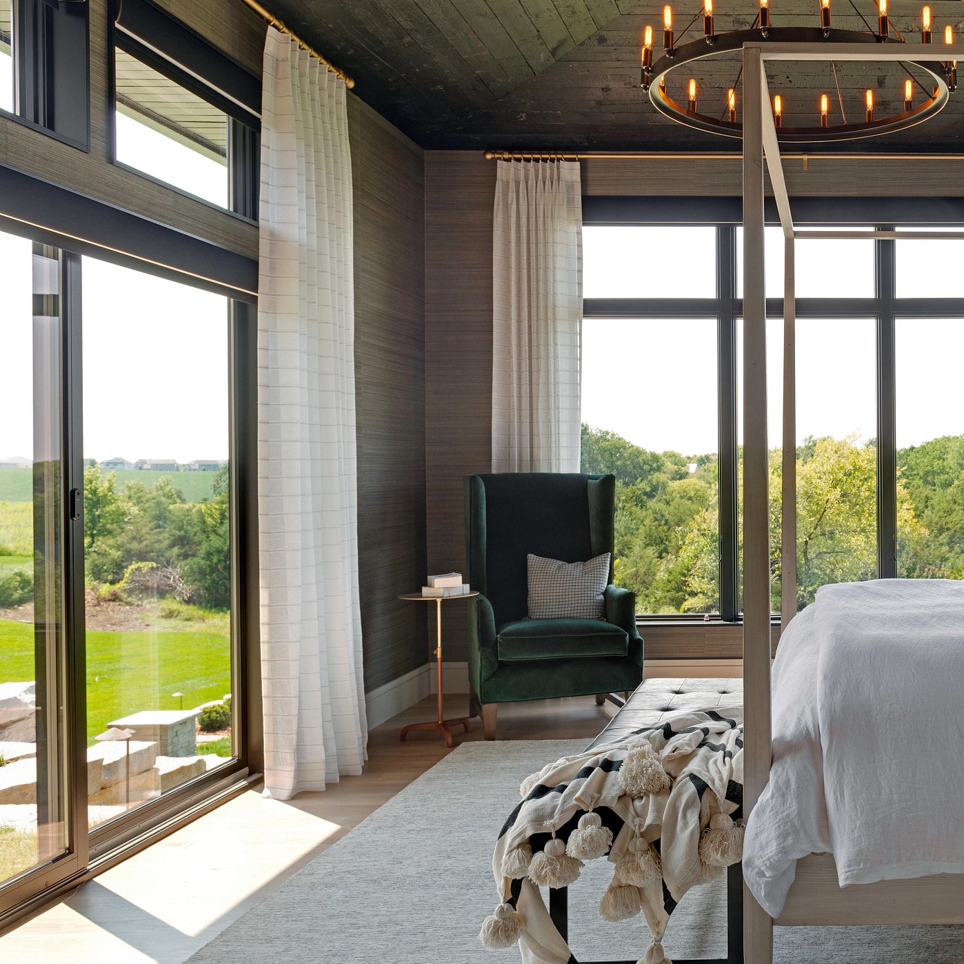 Narroline 200 series sliding patio doors add a modern touch to this bedroom.